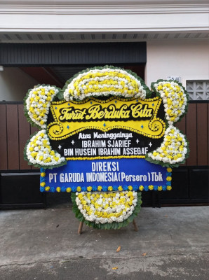 Papan Bunga Duka di 36 Ilir