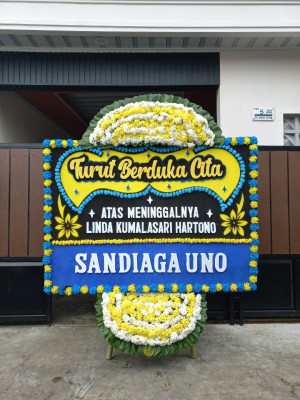 Papan Bunga Duka di 36 Ilir